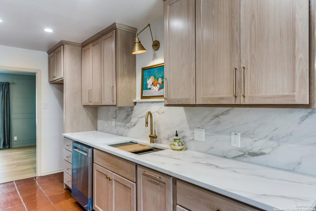 146 Canyon Oaks, Hollywood Park, TX 78232 - kitchen featuring stainless steel dishwasher, a sink, tasteful backsplash, light stone counters, and recessed lighting