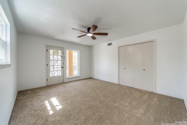 146 Canyon Oaks, Hollywood Park, TX 78232 - unfurnished bedroom featuring carpet flooring, ceiling fan, and a closet