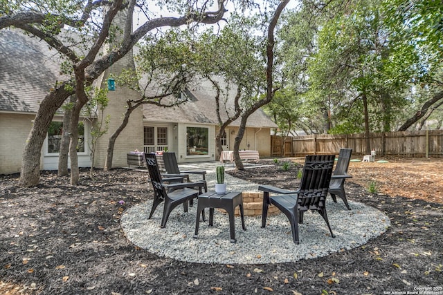 146 Canyon Oaks, Hollywood Park, TX 78232 - view of patio featuring a fire pit and cooling unit