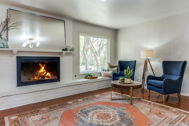 146 Canyon Oaks, Hollywood Park, TX 78232 - sitting room with a brick fireplace and wood finished floors