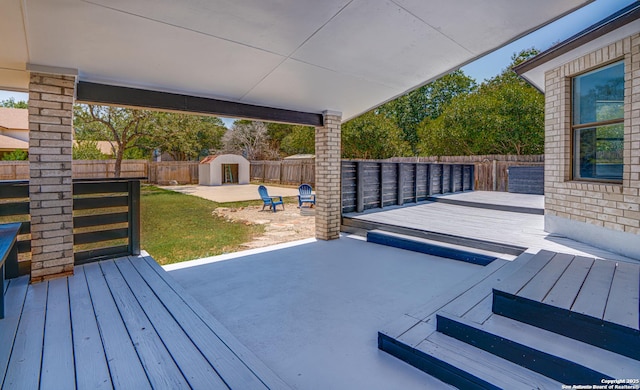 2310 Ruby Oaks, San Antonio, TX 78232 - wooden terrace with a fenced backyard and a patio