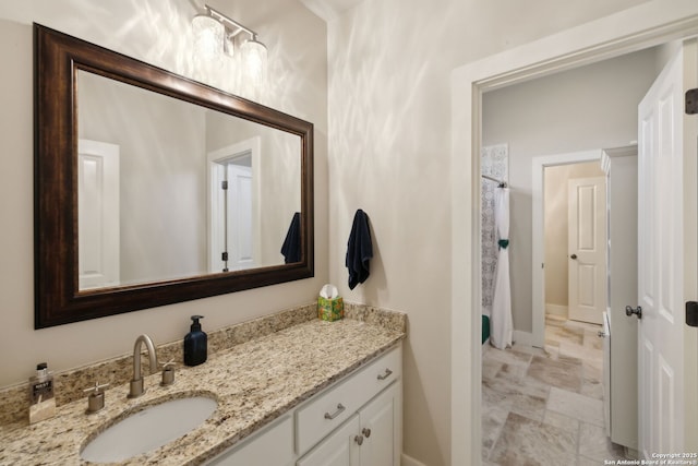 2803 River Way, Spring Branch, TX 78070 - full bathroom featuring vanity, baseboards, and a shower with shower curtain