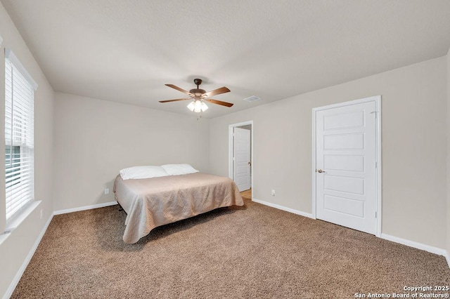 2015 Sisyphus, San Antonio, TX 78245 - bedroom featuring carpet flooring, baseboards, and ceiling fan