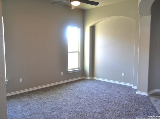 12118 Fort Leaton, San Antonio, TX 78254 - carpeted spare room with a ceiling fan, arched walkways, and baseboards