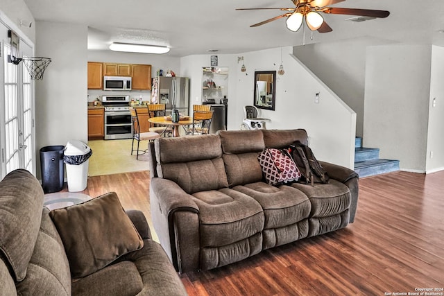 5414 Kensington Run, San Antonio, TX 78228 - living area featuring a ceiling fan, stairs, and light wood finished floors