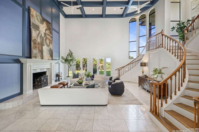 625 Paseo Canada, San Antonio, TX 78232 - living room featuring a high ceiling, stairway, light marble finish flooring, coffered ceiling, and beamed ceiling