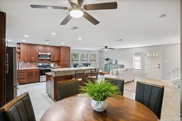 625 Paseo Canada, San Antonio, TX 78232 - dining room with a ceiling fan, healthy amount of natural light, light tile patterned floors, and recessed lighting