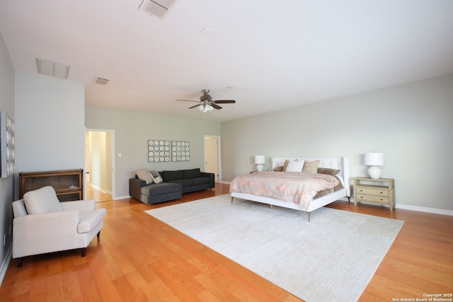 625 Paseo Canada, San Antonio, TX 78232 - bedroom featuring light wood-style flooring, ceiling fan, and baseboards