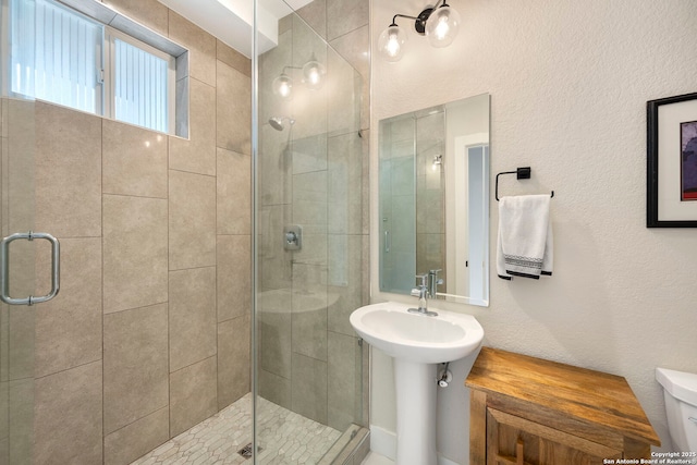 1618 W Lawndale # 2, San Antonio, TX 78209 - bathroom featuring a shower stall and toilet