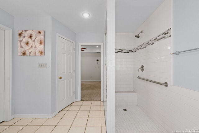 113 Fannin Dr, Kerrville, TX 78028 - bathroom featuring a tile shower, tile patterned floors, recessed lighting, and baseboards