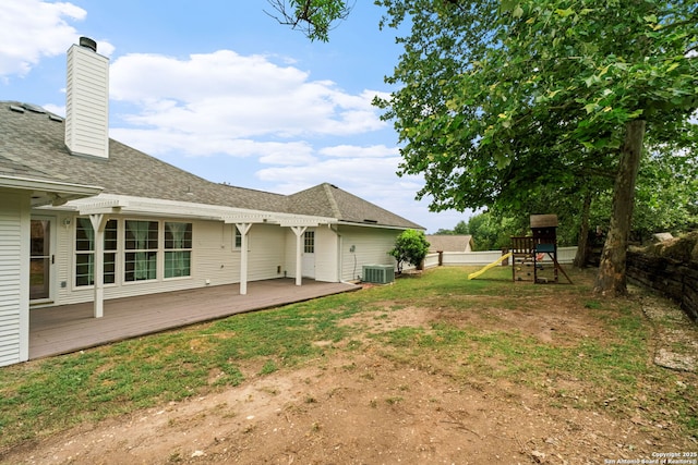 113 Fannin Dr, Kerrville, TX 78028 - view of yard with central AC, a deck, a playground, and a pergola