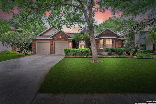 3419 Pinto Pony Ln, San Antonio, TX 78247 - view of front of home featuring an attached garage, a front yard, driveway, and brick siding