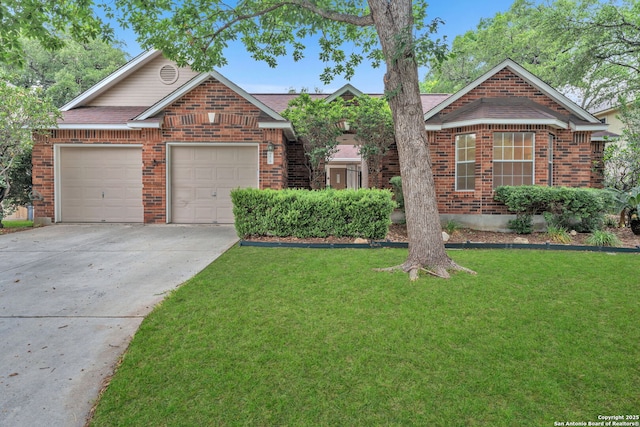 3419 Pinto Pony Ln, San Antonio, TX 78247 - view of front of house featuring brick siding, a front yard, concrete driveway, and an attached garage