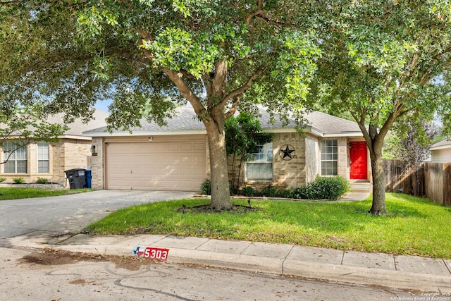 5303 Stormy Sunset, San Antonio, TX 78247 - view of front of home featuring concrete driveway, an attached garage, brick siding, and roof with shingles