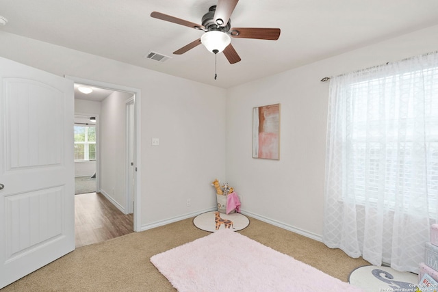 412 Town Frk, Cibolo, TX 78108 - unfurnished bedroom with carpet floors, baseboards, and a ceiling fan