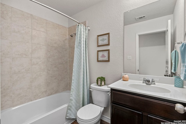 412 Town Frk, Cibolo, TX 78108 - bathroom with toilet, vanity, shower / bath combo, and a textured wall