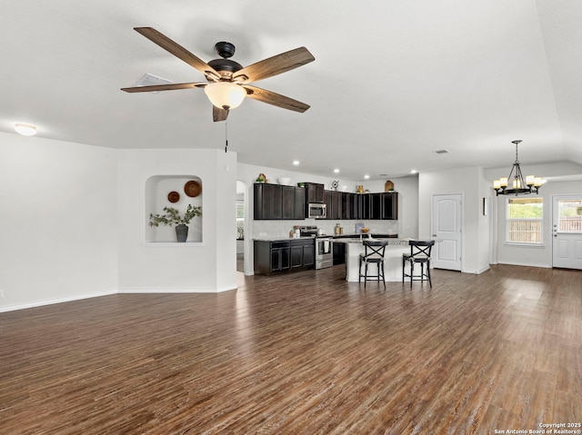 412 Town Frk, Cibolo, TX 78108 - living room featuring a chandelier, dark wood finished floors, baseboards, a ceiling fan, and recessed lighting