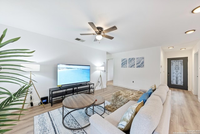 16414 Spruce Cove St, San Antonio, TX 78247 - living area with a ceiling fan, light wood-type flooring, and baseboards