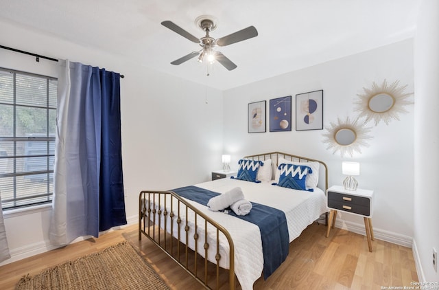 16414 Spruce Cove St, San Antonio, TX 78247 - bedroom with wood finished floors, baseboards, and ceiling fan