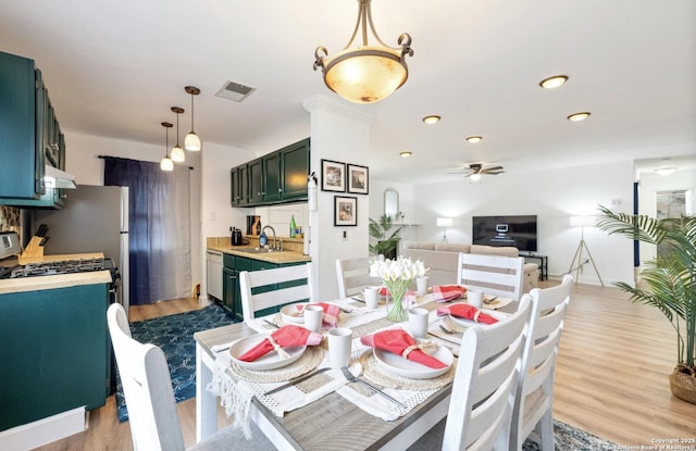 16414 Spruce Cove St, San Antonio, TX 78247 - dining area featuring wood finished floors, a ceiling fan, and recessed lighting