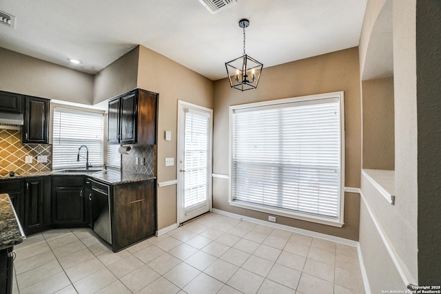 5018 Ashton Audrey, San Antonio, TX 78249 - kitchen featuring a sink, dishwasher, tasteful backsplash, a chandelier, and under cabinet range hood