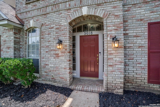5018 Ashton Audrey, San Antonio, TX 78249 - doorway to property with brick siding
