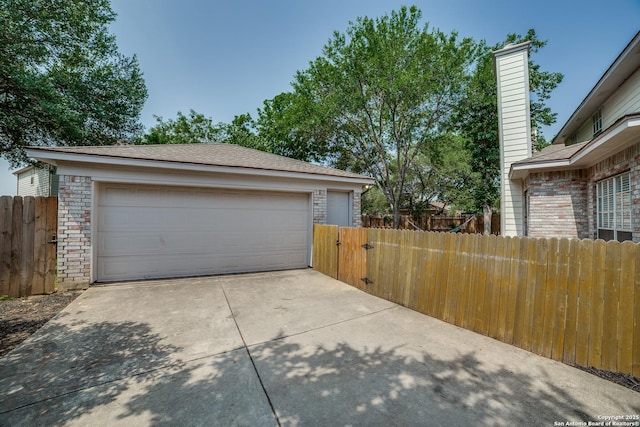 5018 Ashton Audrey, San Antonio, TX 78249 - detached garage with a gate
