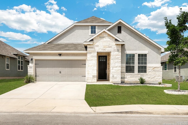 2423 Olive Way, San Antonio, TX 78259 - view of front of house with stone siding, a front lawn, an attached garage, and concrete driveway