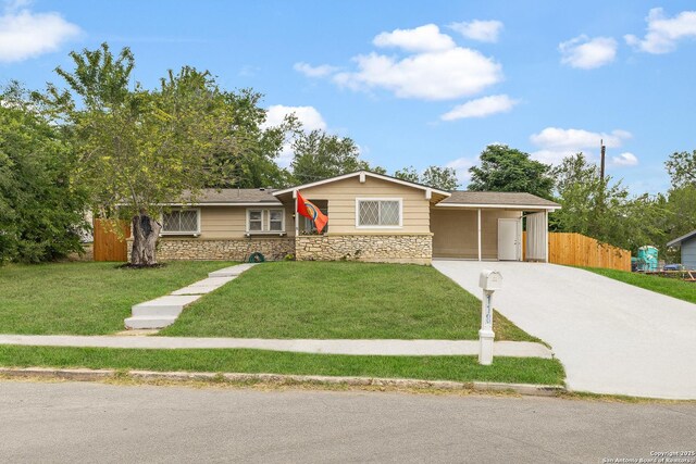118 Peach Vly, San Antonio, TX 78227 - ranch-style house with concrete driveway, stone siding, and a carport
