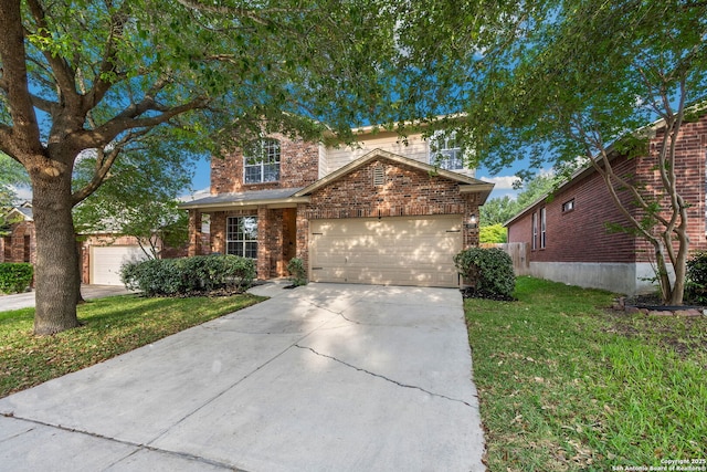 6110 Briscoe Leaf, San Antonio, TX 78253 - traditional-style home with a front yard, brick siding, a garage, and driveway