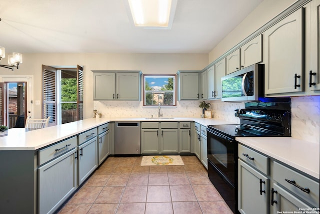 6110 Briscoe Leaf, San Antonio, TX 78253 - kitchen with stainless steel appliances, a peninsula, and backsplash