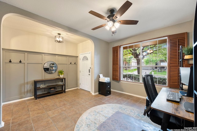 6110 Briscoe Leaf, San Antonio, TX 78253 - office area featuring arched walkways, a ceiling fan, light tile patterned floors, and baseboards