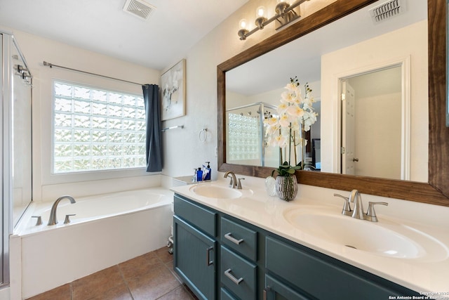 6110 Briscoe Leaf, San Antonio, TX 78253 - bathroom with double vanity, a bath, and tile patterned floors