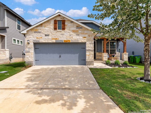 11547 Lightning Way, San Antonio, TX 78245 - view of front of house featuring stone siding, a front lawn, a porch, concrete driveway, and a garage
