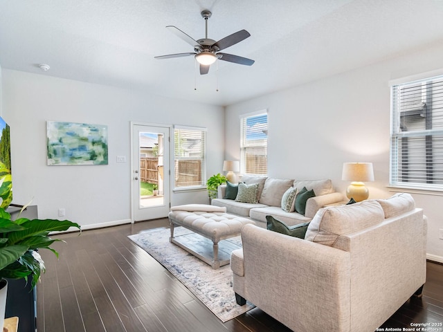 11547 Lightning Way, San Antonio, TX 78245 - living area featuring a ceiling fan, dark wood finished floors, and baseboards