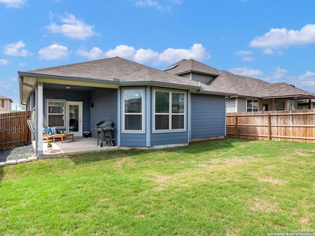 11547 Lightning Way, San Antonio, TX 78245 - back of house with a patio and roof with shingles