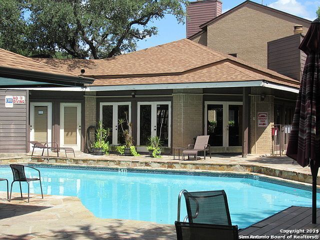 8611 Datapoint Unit 59, San Antonio, TX 78229 - swimming pool featuring french doors