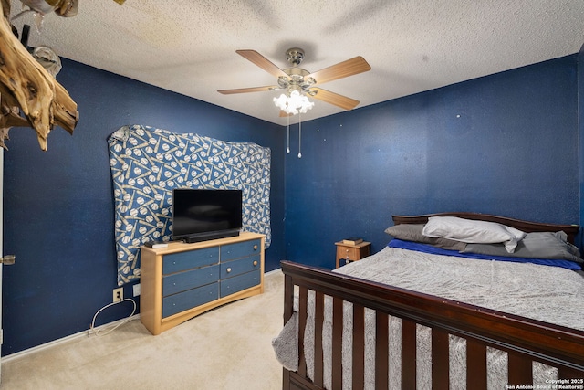 6283 Valley Bay, San Antonio, TX 78250 - bedroom with carpet flooring, a ceiling fan, baseboards, and a textured ceiling