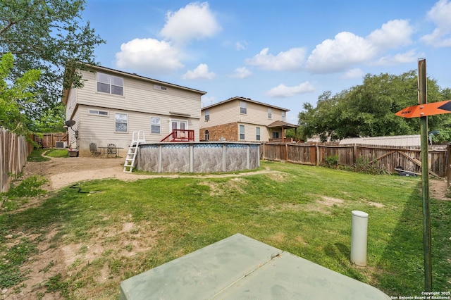 10715 Black Wolf Bay, San Antonio, TX 78245 - rear view of house with a patio