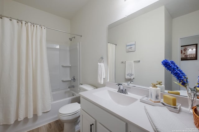 5266 Anzueto, San Antonio, TX 78261 - bathroom with toilet, vanity, shower / bathtub combination with curtain, and wood finished floors