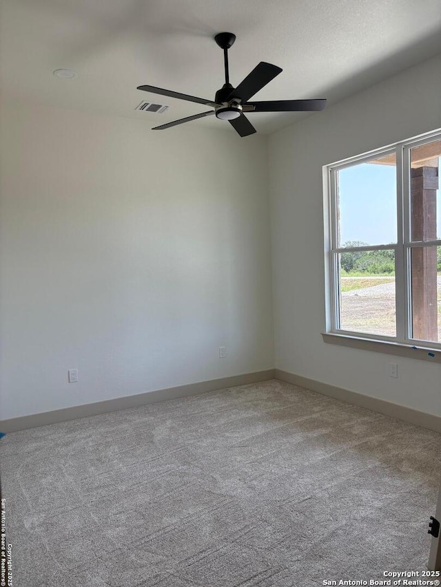 811 Horseshoe Fls, Bandera, TX 78003 - carpeted spare room featuring a ceiling fan and baseboards