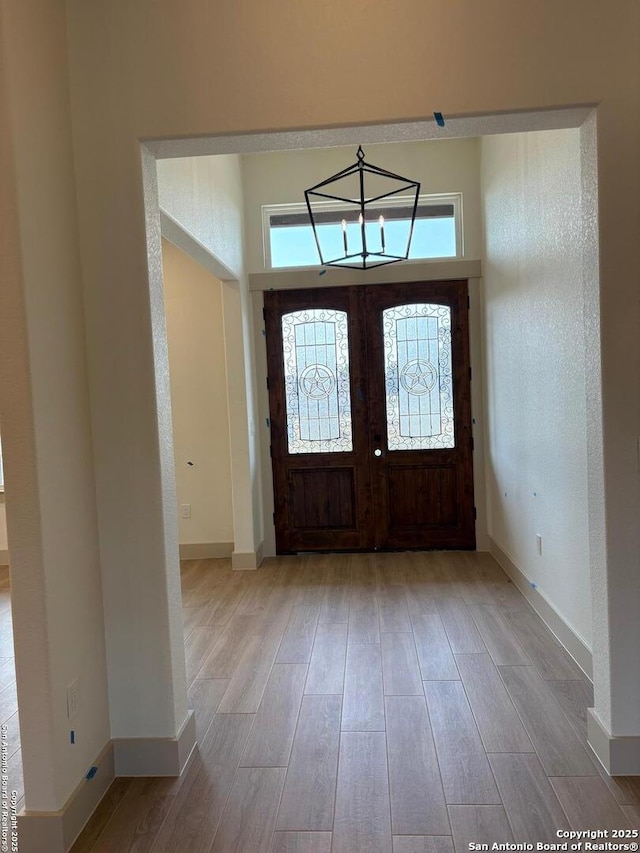 811 Horseshoe Fls, Bandera, TX 78003 - foyer with light wood-type flooring and baseboards