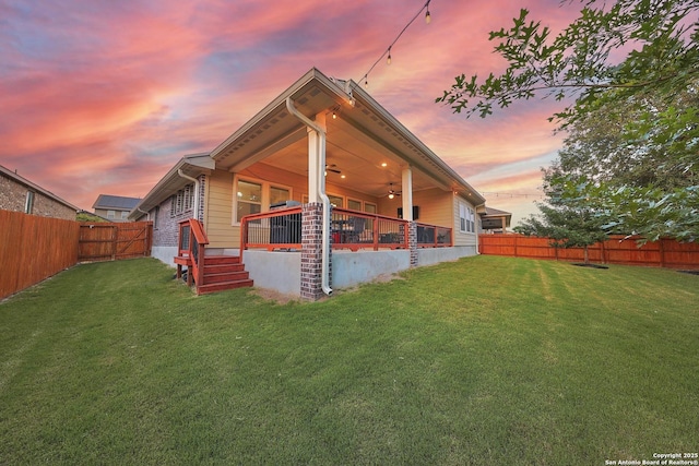 12322 Saddle Up Dr, San Antonio, TX 78254 - rear view of house with a ceiling fan