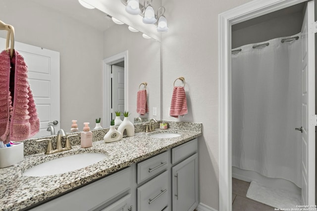3130 Running Fawn, San Antonio, TX 78261 - bathroom featuring double vanity, tile patterned floors, and shower / bath combination with curtain