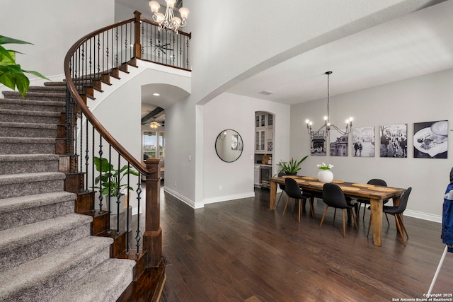 3130 Running Fawn, San Antonio, TX 78261 - dining area featuring a chandelier, baseboards, hardwood / wood-style floors, and stairway