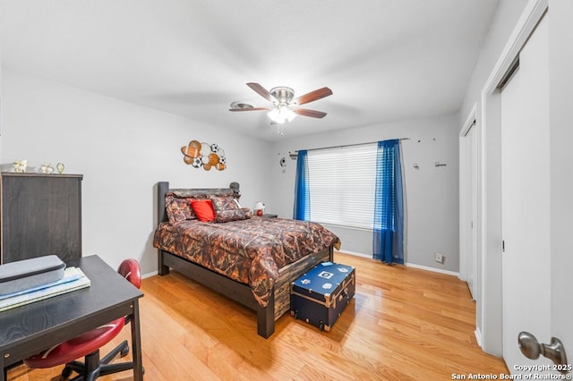 711 Cardinal Dr, Kerrville, TX 78028 - bedroom featuring light wood-style flooring, baseboards, and ceiling fan