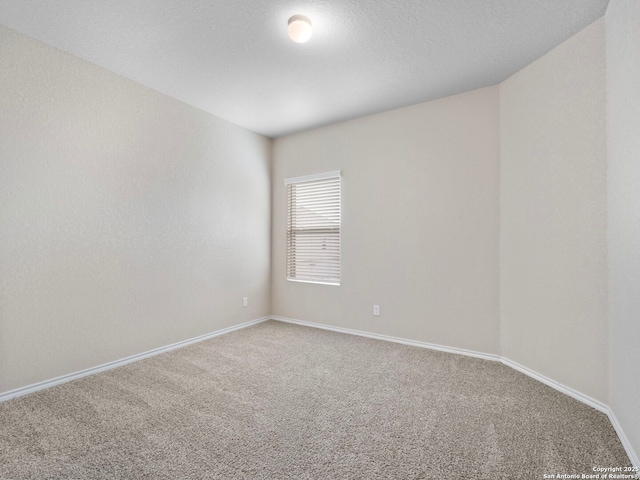 10518 Green Rock, San Antonio, TX 78223 - carpeted empty room with baseboards