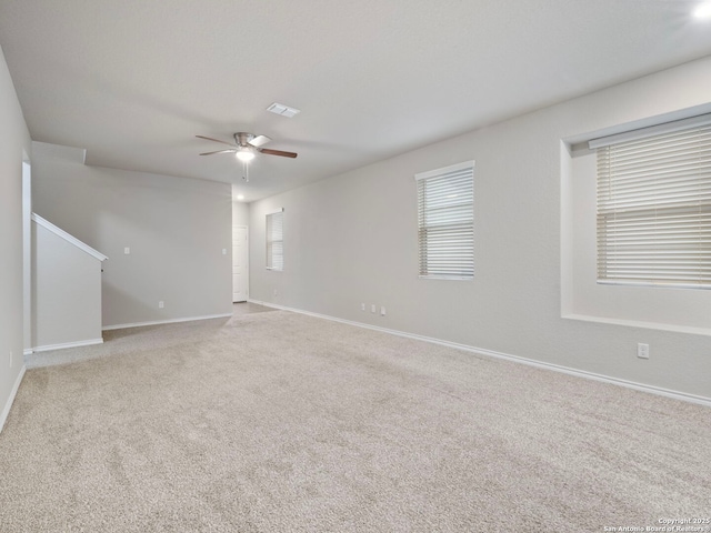 10518 Green Rock, San Antonio, TX 78223 - carpeted spare room with ceiling fan and baseboards