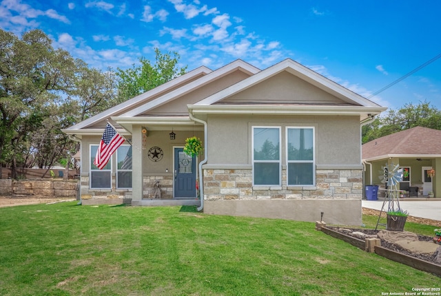 2872 Lakeview Dr, Canyon Lake, TX 78133 - view of front facade featuring stone siding, stucco siding, and a front yard