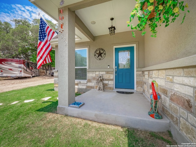 2872 Lakeview Dr, Canyon Lake, TX 78133 - entrance to property with stone siding, a yard, and stucco siding